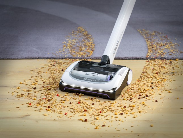 AirRAM Platinum Anti Hair Wrap Cordless Vacuum & Speed Cleaning Kit cleaning up mess on the floor